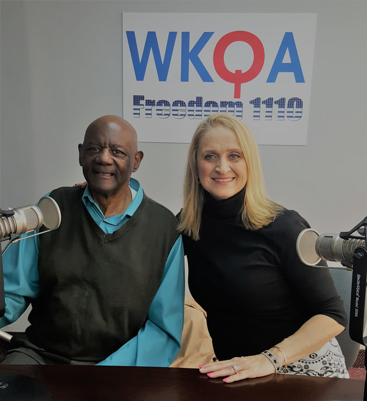 Drs. Jack Gaines and Christine Bacon behind the microphones at the WKQA radio desk.