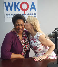 Dr. Bacon gives a great big kiss to her dear frind and radio show guest Deanna Stevens.