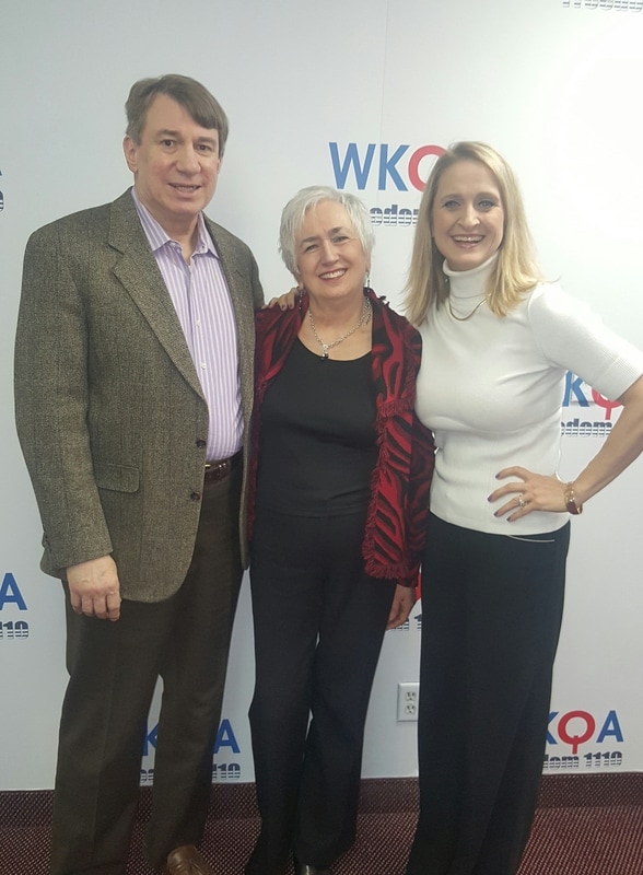 Dr. Christine M. Bacon pictured with guests Butch and Sandy Guthrie at the WKQA Studios in Norfolk, Virginia. 