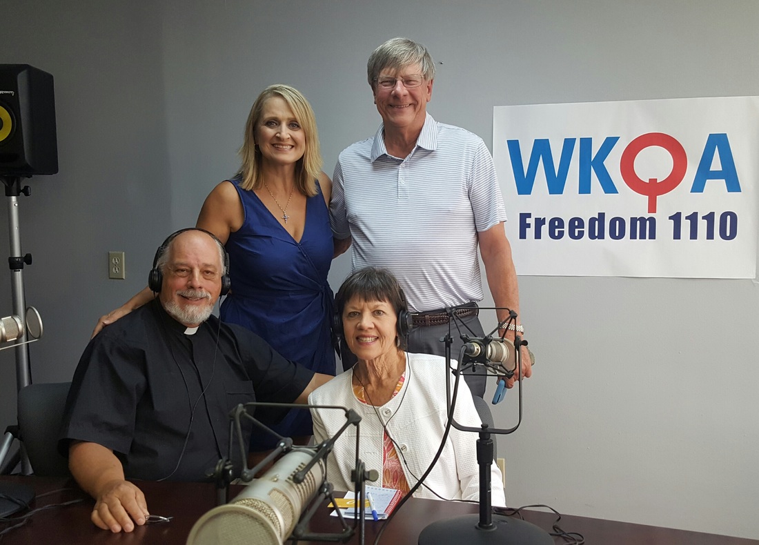 Guests Rev. Vernon Murray, his wife Jackie Murray, Mike Siedlecki and host Dr. Christine Bacon at the WKQA studios in Norfolk, Virginia.