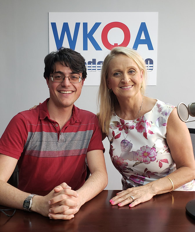 Dr Bacon and Alex Madajian behind the desk at the WKQA studio.