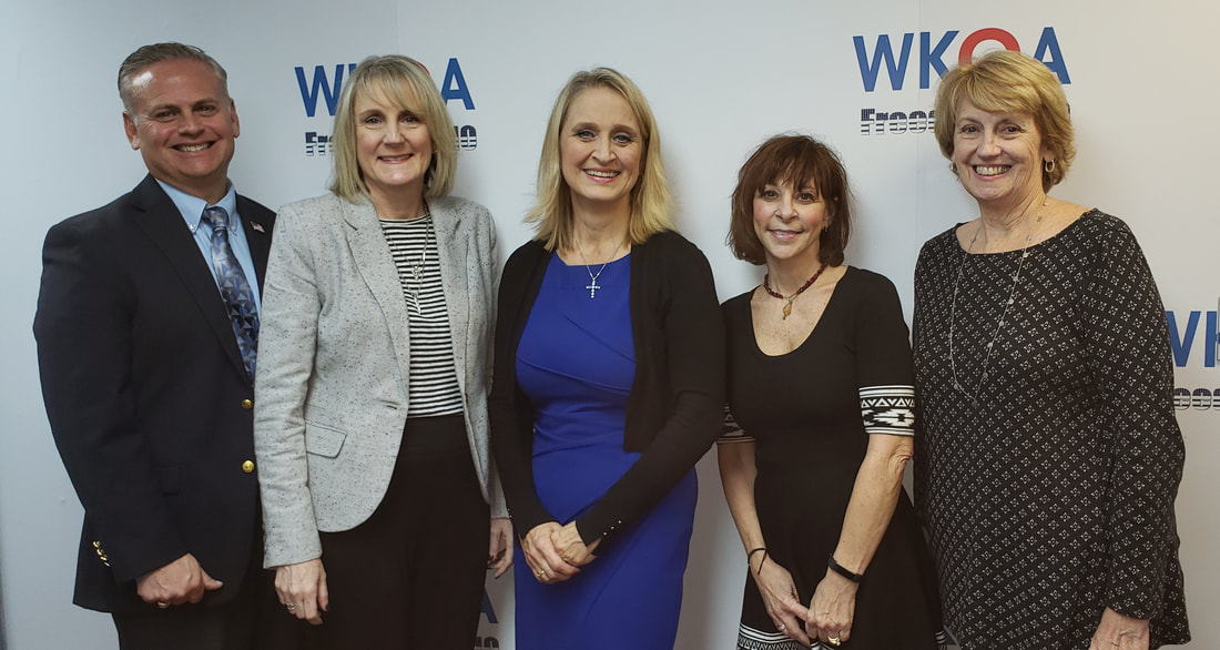 Guests (L to R) Lou Goldberg, Jenny Franklin, (host) Dr. Christine Bacon, Mary Cunningham, and Joan Blind in the WKQA studios celebration Catholic Schools Week. 