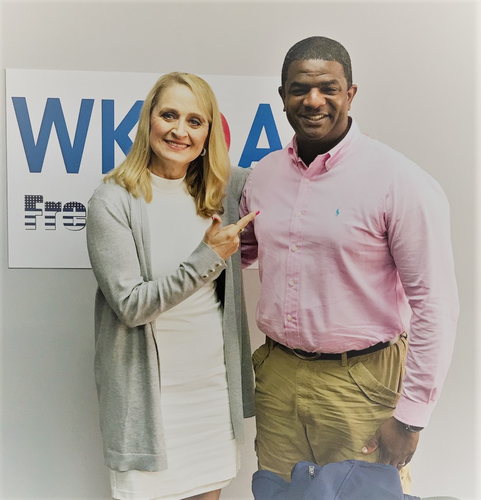 Host Christine Bacon with Pastor Banks in the WKQA studios.